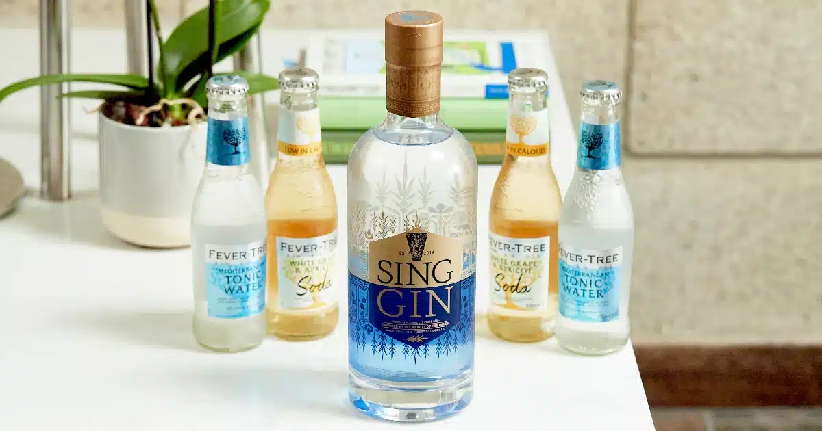 Sing Gin bottle with four bottles of Fever Tree mixers