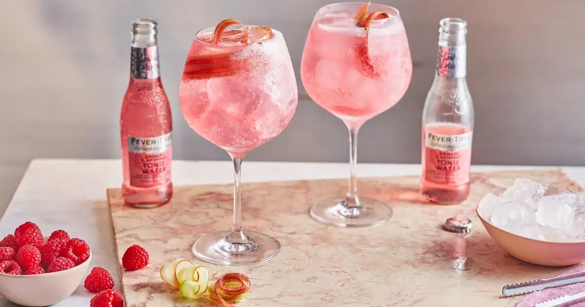 Glasses of Sing Gin and pink Fever-Tree raspberry tonic 